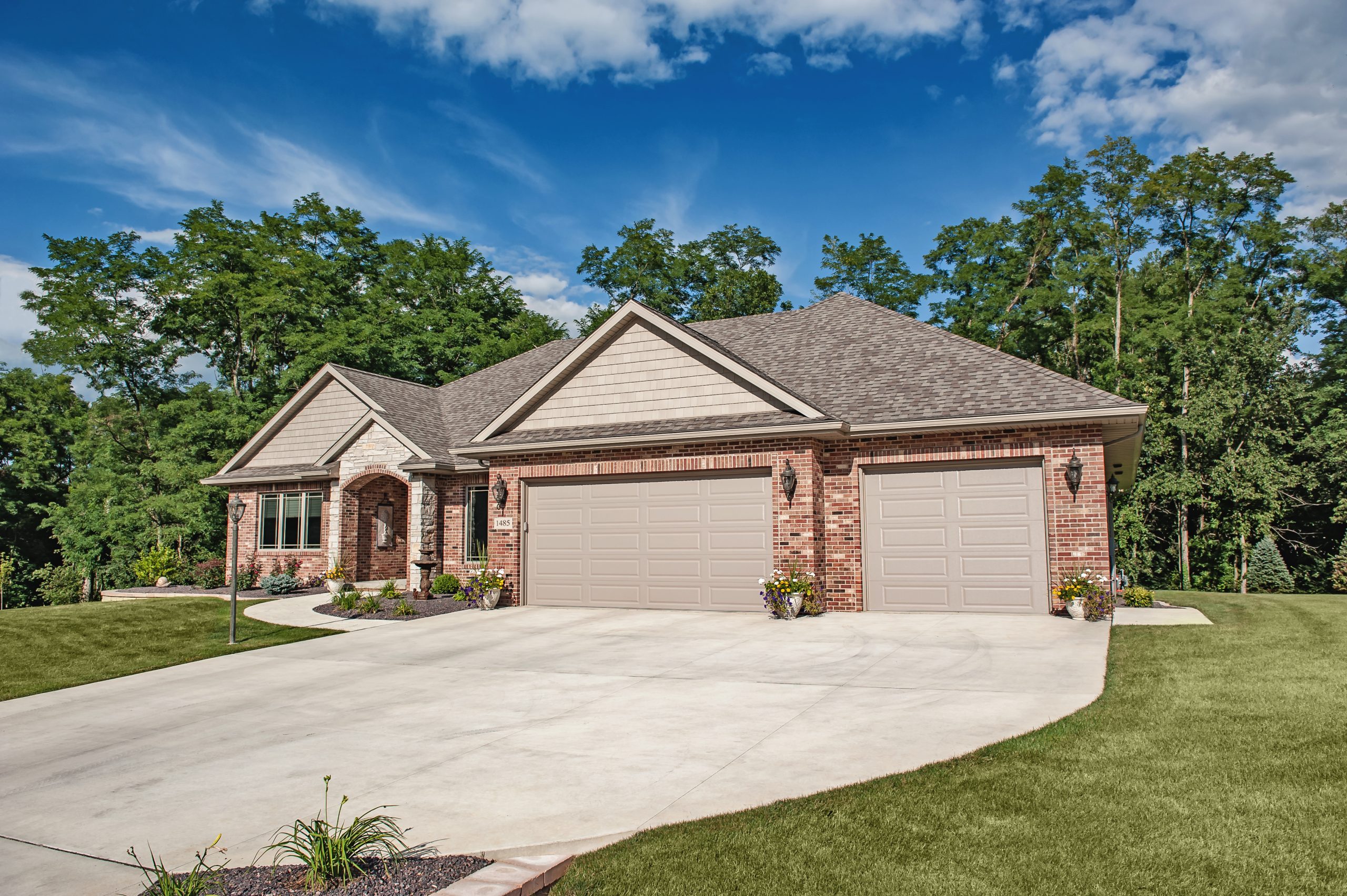 Double CHI raised panel garage door on a home