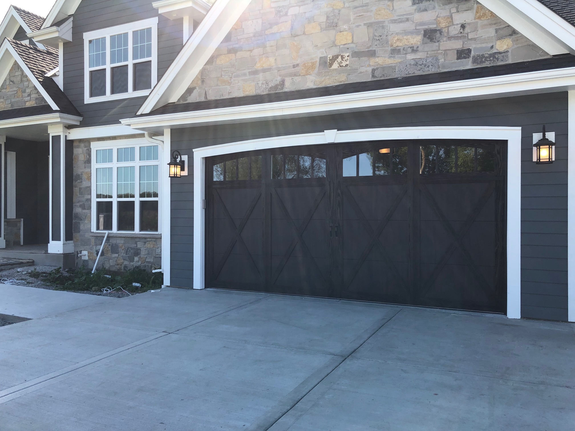 CHI garage door in black with windows