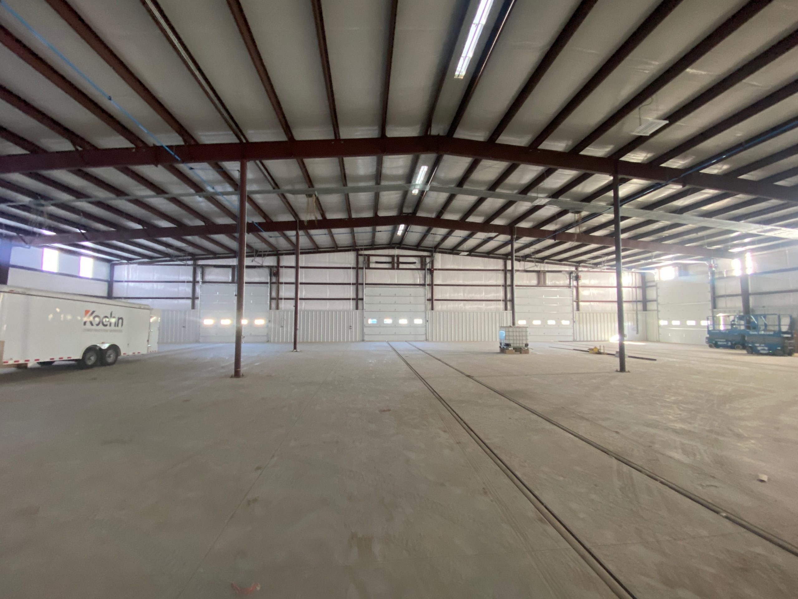 Insulated commercial doors in a large warehouse